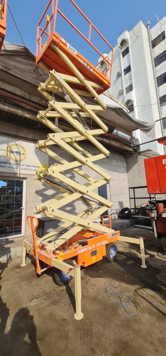 Scissor lift 9 m — X-Lift · XL900 · 2022 · Orange — photo 2 of 2